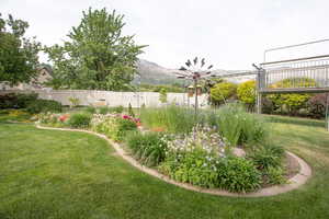 View of yard with a mountain view