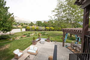 View of patio with a mountain view