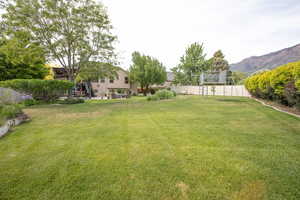 View of yard with a mountain view