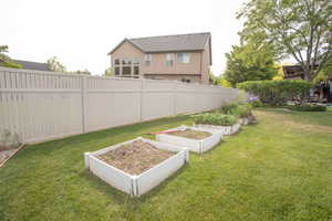 View of yard featuring a garden