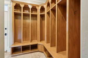Side entrance/ mud room with built-ins.