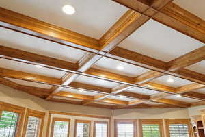 The cross-beam ceiling detailing brings character and warmth to the entertaining and relaxing space.