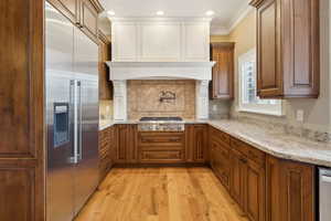 Gas range and vented range hood