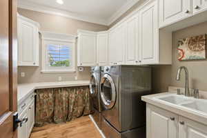 Main laundry room with sink and plenty of room for folding.