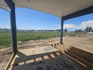 View of yard with a rural view