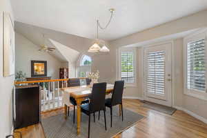 Dining space featuring light wood-style floors and baseboards