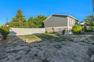 View of fenced backyard