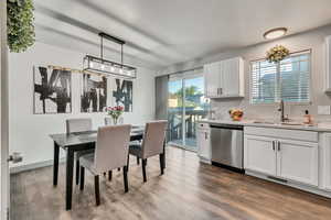 A view of dining space with a chandelier