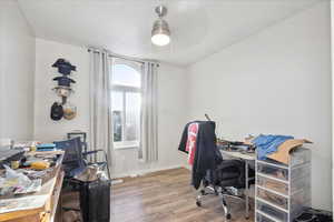 Office featuring wood finished floors, ceiling fan, and baseboards