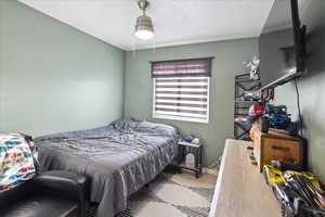 Bedroom with wood finished floors