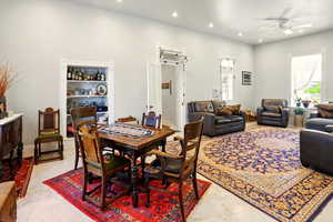 Dining room featuring a ceiling fan and recessed lighting