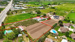 View of rural area featuring property boundaries highlighted and extensive farmland