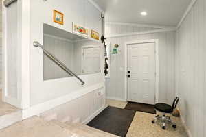 Mudroom with baseboards and recessed lighting