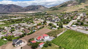Aerial view of residential area with a mountainous background