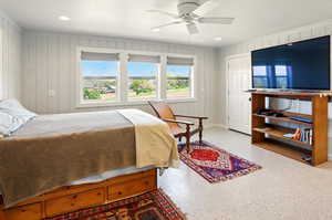 Bedroom with recessed lighting, ceiling fan, and baseboards