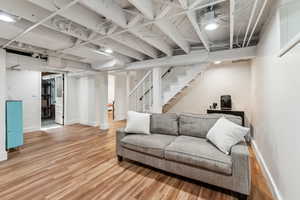 Basement living room with LVP flooring