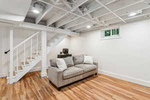 Basement living room with LVP flooring
