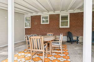 View of patio featuring outdoor dining area