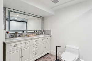 Large basement bathroom with double vanity