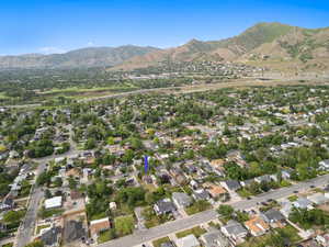 View of property with a mountain backdrop