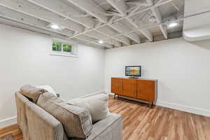 Basement living room with LVP flooring