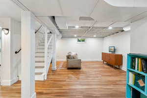 Basement living room with LVP flooring