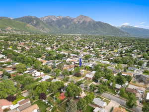 View of property with a mountain backdrop