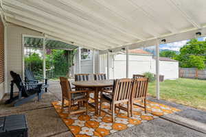 View of back patio and outbuilding/office