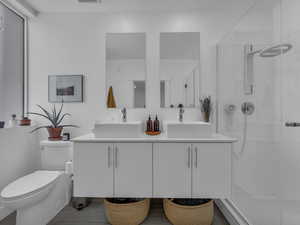 Primary en-suite bathroom with double sinks