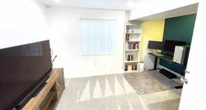 Office space featuring carpet flooring