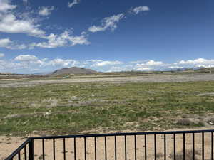 View of mountain background featuring rural landscape