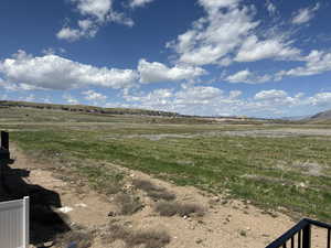 View of yard with a view of countryside