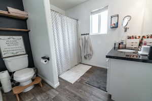 Bright and airy master bath with walk-in shower and vanity.