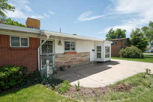 Rear view of house with a patio area