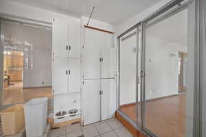 Bathroom with tile patterned flooring