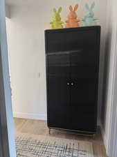 Detailed view of wood finished floors and baseboards