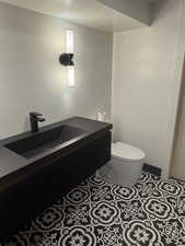 Bathroom featuring toilet and vanity