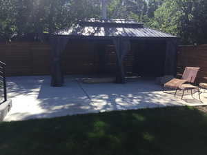 View of patio / terrace featuring a gazebo