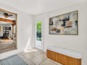 Laundry/mud room with backyard door