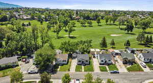 Aerial view of residential area with a local golf course
