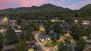 Aerial view at dusk of a mountain view and a residential view