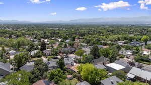 Aerial view of residential area featuring mountains