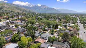Aerial perspective of suburban area featuring a mountain backdrop