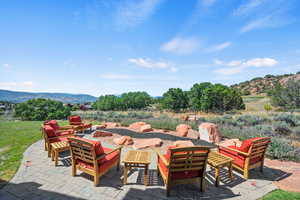View of patio / terrace with a mountain view