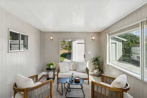 Sunroom featuring healthy amount of natural light