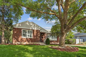 View of front of home with brick siding