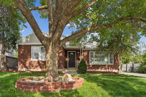 View of front of house featuring brick siding
