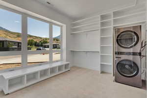 Primary Closet with laundry and builtins