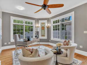 A spacious rear addition, currently staged as an office, offers versatile potential; as a recreational room, sixth bedroom, and more. With easy access to the private courtyard and backyard, it features period sconces and a beautiful stained glass window.