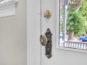 Original to the late 1800s, the home features exquisite brass knobs; each a tiny masterpiece of craftsmanship, showcasing the intricate detail and timeless quality only found in historic homes.